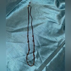 Suede type material w/ silver tone layer necklace